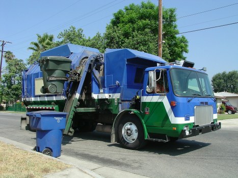 Commercial waste crew in Bayswater preparing a van for collection
